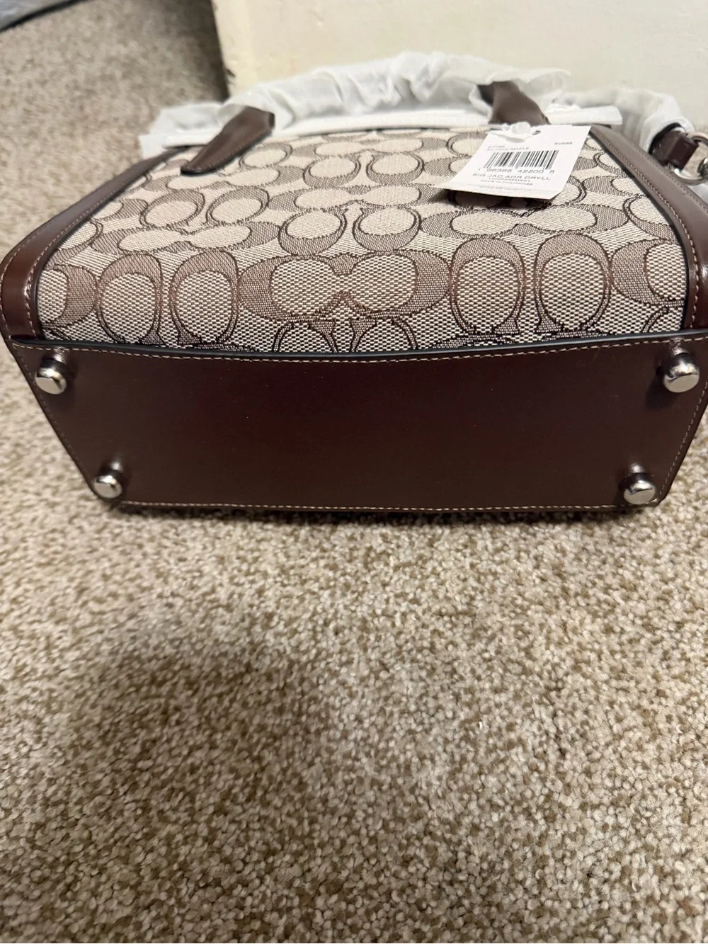 Coach Signature purse with Brown Leather Trim